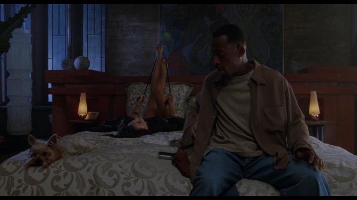 Téa Leoni and Martin Lawrence in Bad Boys (1995)