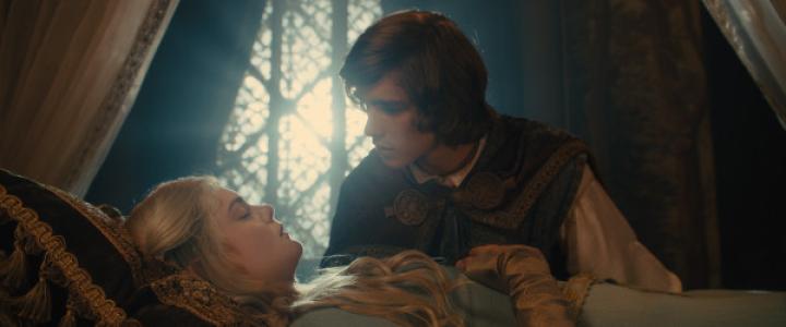 Elle Fanning and Brenton Thwaites in Maleficent (2014)