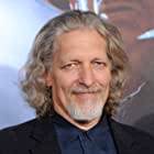 Clancy Brown به عنوان Damien Darkblood