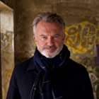 Sam Neill به عنوان Duncan Stewart