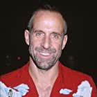 Peter Stormare به عنوان John Abruzzi