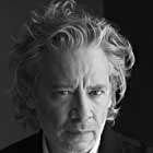 Dexter Fletcher به عنوان John W. Martin