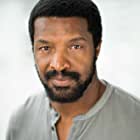 Roger Cross به عنوان Travis Verta