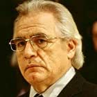 Brian Cox به عنوان Logan Roy