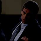 Rus Blackwell به عنوان Commander Atkins