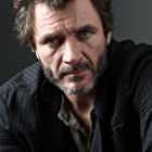 Alex Brendemühl به عنوان Tasio