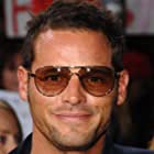 Justin Chambers به عنوان Dr. Alex Karev