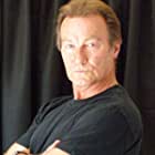 Graham Clarke به عنوان Laurence