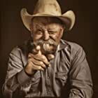 Barry Corbin به عنوان Ellis