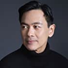 Joel de la Fuente به عنوان Johann Pryce