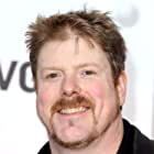 John DiMaggio به عنوان Manly Dan
