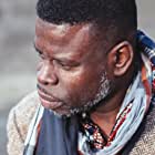 Femi Elufowoju Jr. به عنوان Cardinal Aked Amoah