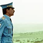 Sasson Gabay به عنوان Anwar Sadat