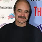 David Haig به عنوان Carlo Edwards