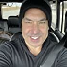Rick Hoffman به عنوان Louis Litt