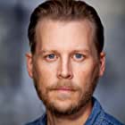 David Hoflin به عنوان Officer Lowe