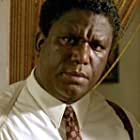 Tommy Hollis به عنوان Earl Little