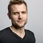 Neil Hopkins به عنوان Adam