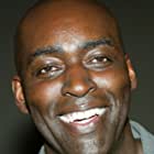 Michael Jace به عنوان Major Frank Santos