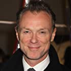 Gary Kemp به عنوان Sy Spector