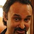 Jameel Khan به عنوان Ghanshyam, Janaki's husband, who is a banker