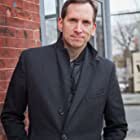 Stephen Kunken به عنوان Warren Putnam