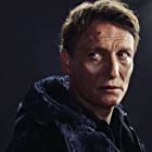 Oliver Masucci به عنوان Ulrich Nielsen