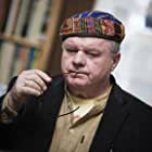 Jack McGee به عنوان George Ward
