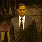 Christopher Neame به عنوان Defender