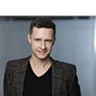 Chris Owens به عنوان Detective Wolf