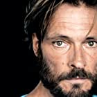 Andreas Pietschmann به عنوان The Stranger