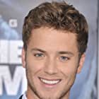 Jeremy Sumpter به عنوان Young Sam 'Shooter' Green