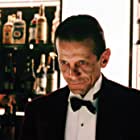 Joe Turkel به عنوان Lloyd