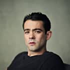 Jack McMullen به عنوان Charlie Agapiou