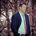 Christopher Rosamond به عنوان Boone