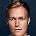 Christian Rubeck به عنوان Leon Amundsen