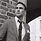 Henry Lloyd-Hughes به عنوان Allen Scott-Frank