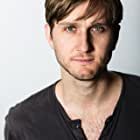 Aaron Staton به عنوان Pastor