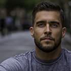 Josh Segarra به عنوان Augustus Pugliese