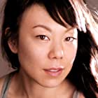 Ali Ahn به عنوان Suzanne Wu