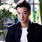 Yiwei Zhou به عنوان Ding Xiu