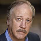 Richard L. Olsen به عنوان Older Policeman