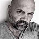 Colin Burt Vidler به عنوان Thug 2