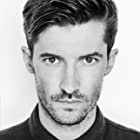 Gwilym Lee به عنوان Grigor Dymov