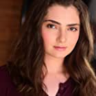 Emily Robinson به عنوان Charlotte Grimes