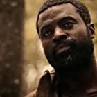 Philip Fornah به عنوان Minuteman #1