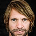 Luc Schiltz به عنوان Christoph Hartmann