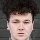 Thommas Kane-Byrne به عنوان Francis 'Fudge' Flynn