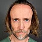 Stefan Woelk به عنوان Major Sauckel