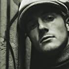 Micheál Richardson به عنوان Kyle Coxman